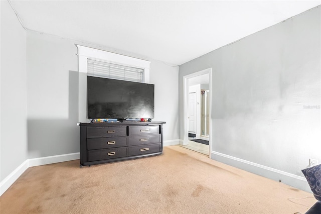 unfurnished bedroom featuring light colored carpet