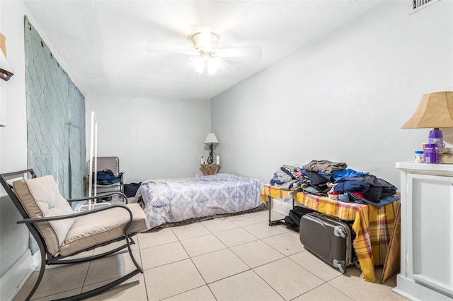 bedroom featuring ceiling fan and light tile patterned flooring