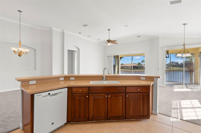 kitchen with dishwasher, sink, ornamental molding, light carpet, and a center island with sink