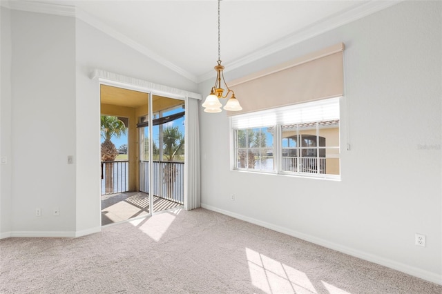 carpeted spare room featuring lofted ceiling, crown molding, and an inviting chandelier