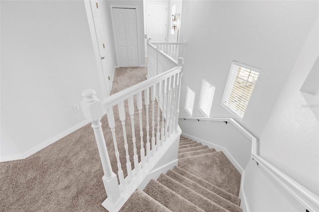 stairway with carpet floors