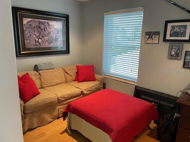 bedroom with light hardwood / wood-style flooring