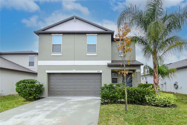 view of front of house featuring a garage and a front yard