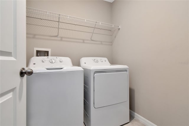 laundry area featuring separate washer and dryer