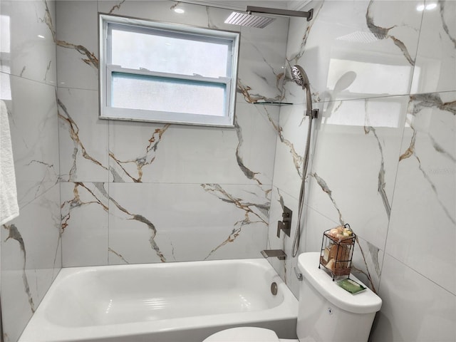 bathroom featuring toilet and tub / shower combination