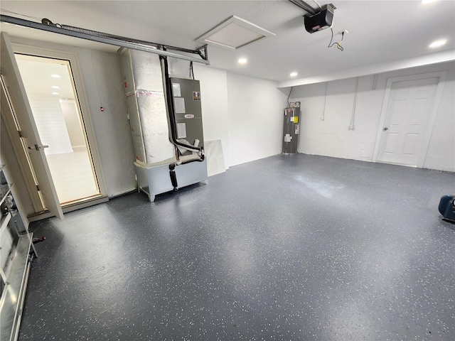 garage featuring heating unit, a garage door opener, and water heater