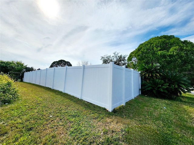 view of yard with fence