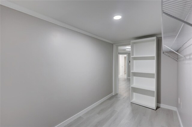 9334 Ledgestone Ln, Port Richey, FL 34668 - walk in closet featuring light wood-style floors