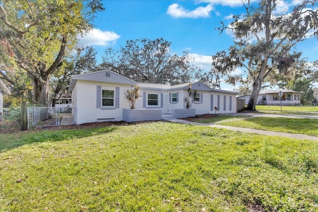 single story home with a front yard