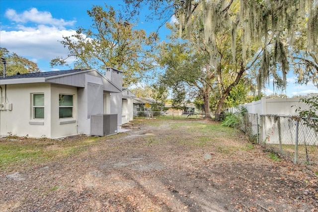 view of yard featuring central AC unit