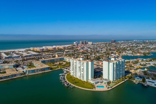 drone / aerial view with a city view and a water view