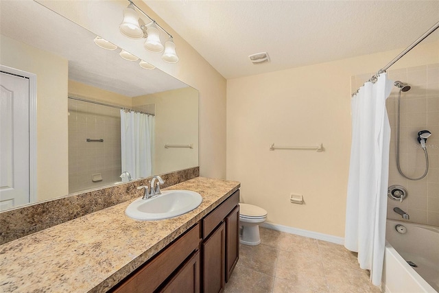 full bathroom with vanity, shower / bath combo, and toilet