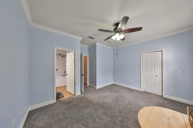 unfurnished bedroom with connected bathroom, light carpet, a closet, ceiling fan, and crown molding