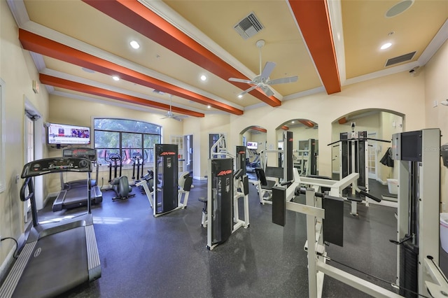 workout area with ceiling fan and crown molding