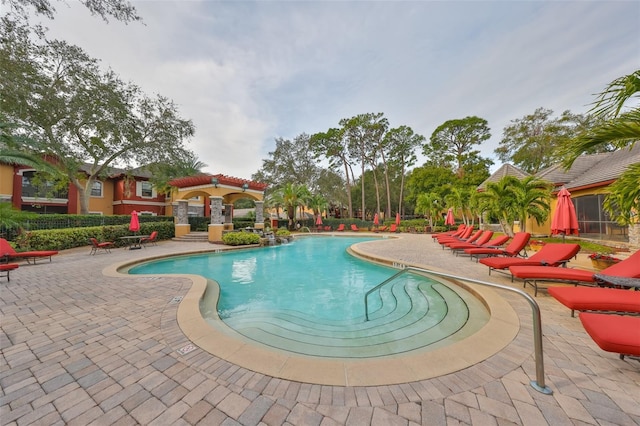 2160 Chianti Pl Unit 11-0117, Palm Harbor, FL 34683 - community pool featuring a patio