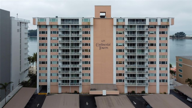 view of building exterior featuring a water view