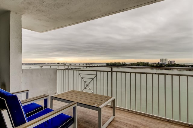 view of balcony at dusk