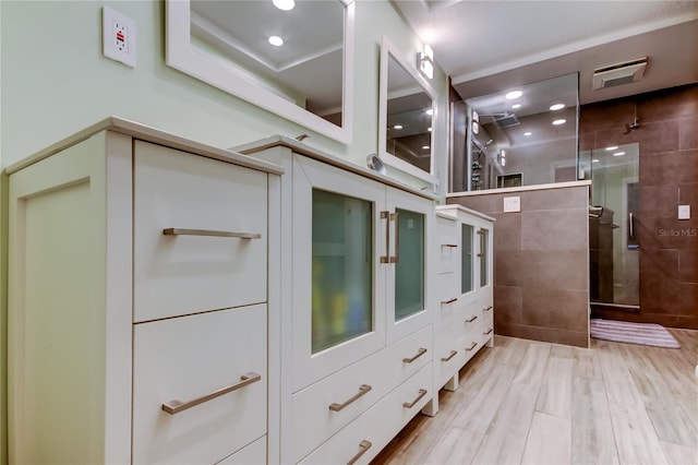 interior space featuring a shower and hardwood / wood-style flooring