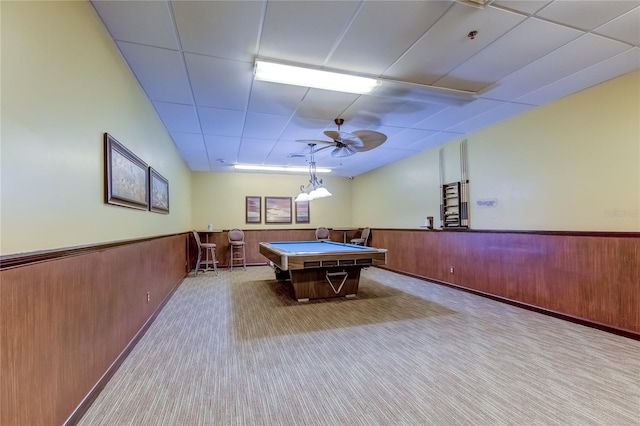 rec room with ceiling fan, pool table, light carpet, and wooden walls