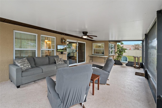 living room featuring ceiling fan