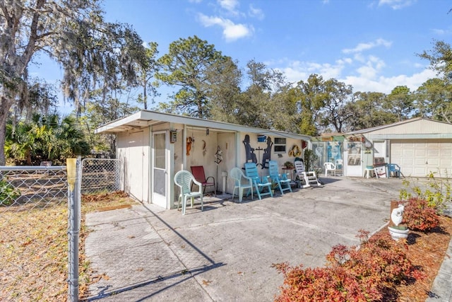 view of outbuilding with a garage