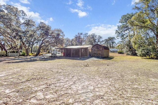 exterior space with a shed