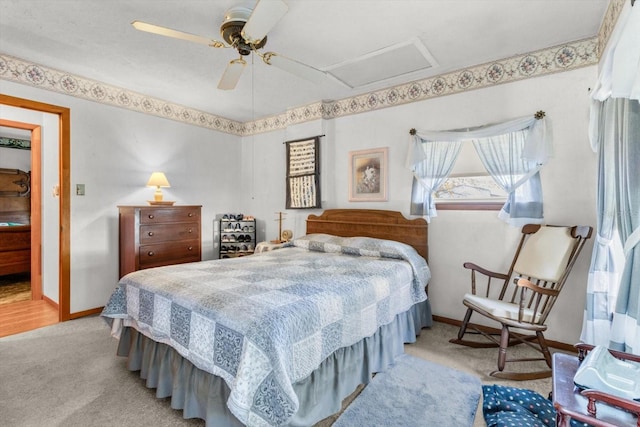 bedroom featuring ceiling fan and light carpet