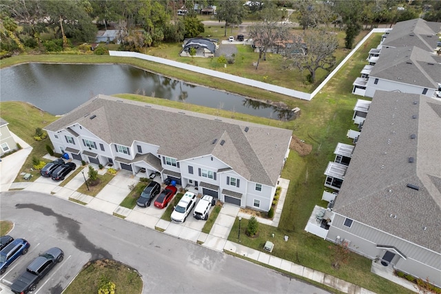 drone / aerial view featuring a water view