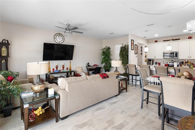 living room with ceiling fan