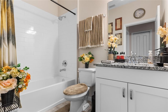 full bathroom featuring shower / bathtub combination with curtain, vanity, and toilet