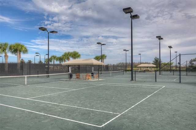 view of tennis court with a gazebo