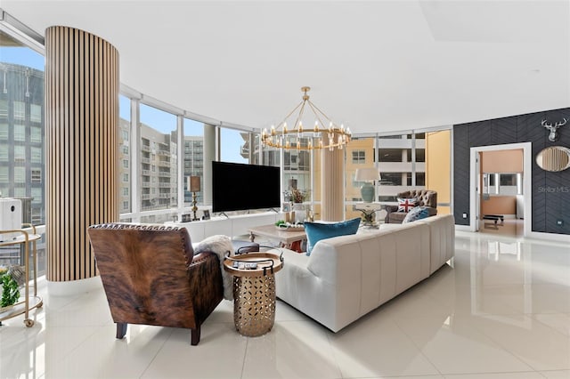 tiled living room with expansive windows, a notable chandelier, and wooden walls