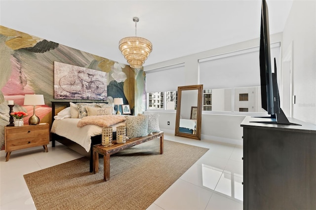 tiled bedroom with a notable chandelier