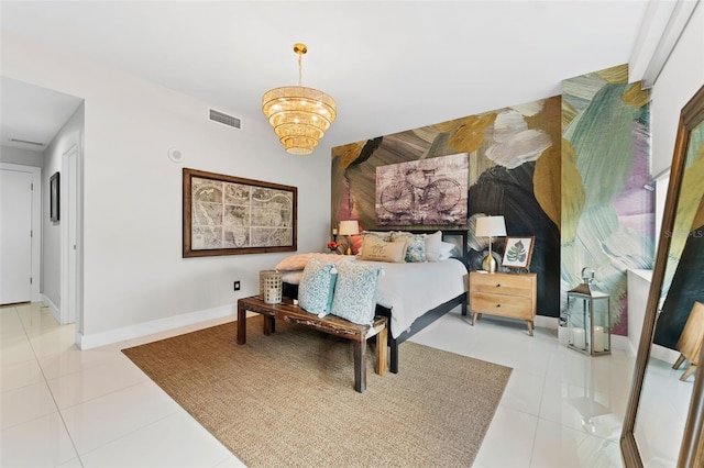 tiled bedroom with an inviting chandelier