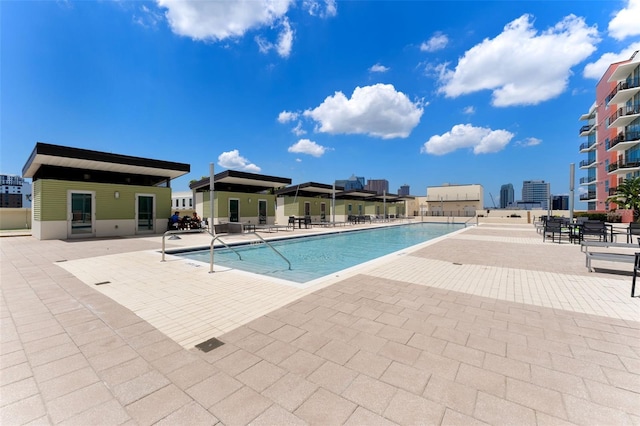 view of pool featuring a patio