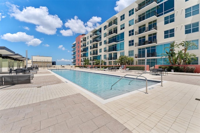 view of pool featuring a patio