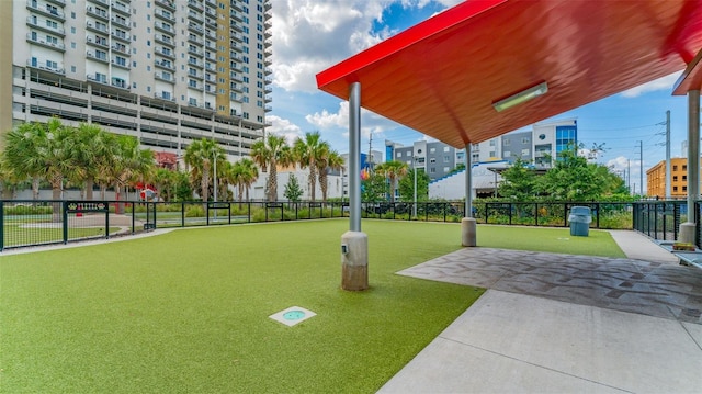 view of home's community featuring a lawn