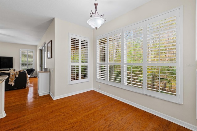 interior space with hardwood / wood-style floors