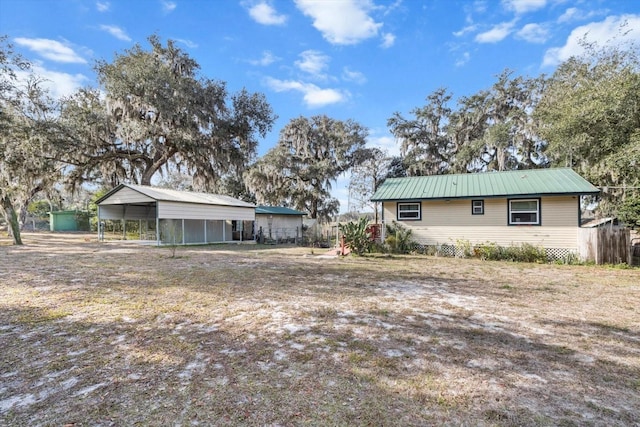 exterior space featuring a carport