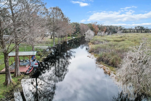 exterior space featuring a water view and a rural view