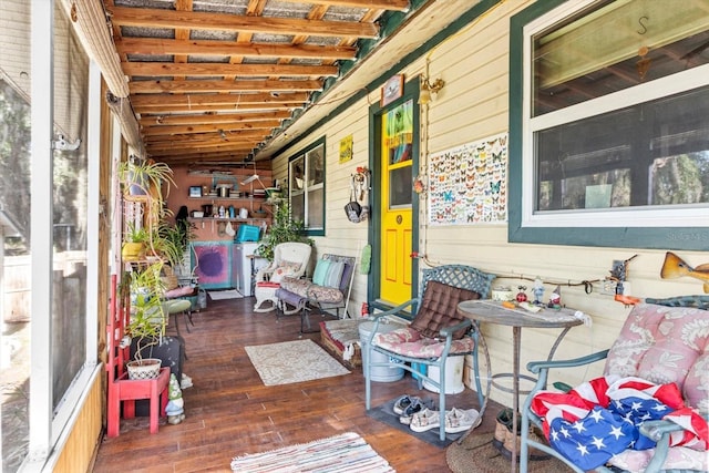 wooden terrace featuring a porch