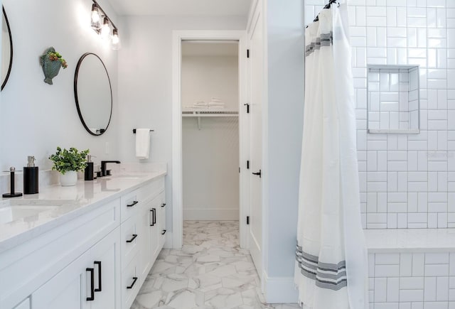 bathroom with vanity and curtained shower