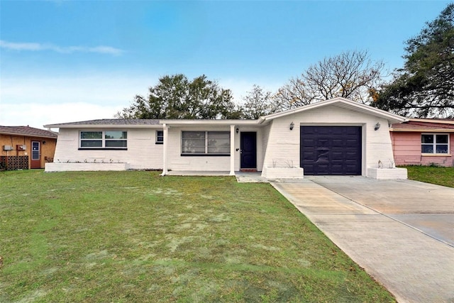 single story home featuring a garage and a front yard