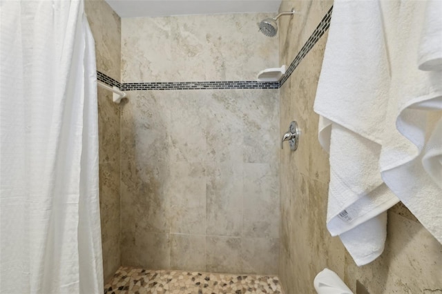 bathroom with curtained shower