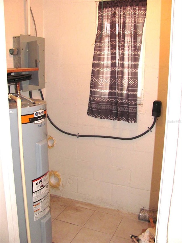 utility room with electric water heater