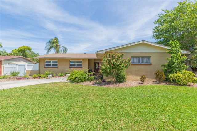 ranch-style house with a front yard