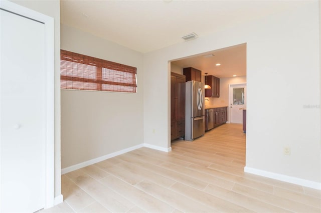 interior space with light hardwood / wood-style floors