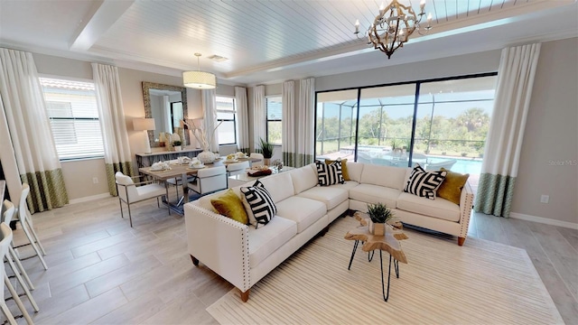 living room featuring a notable chandelier