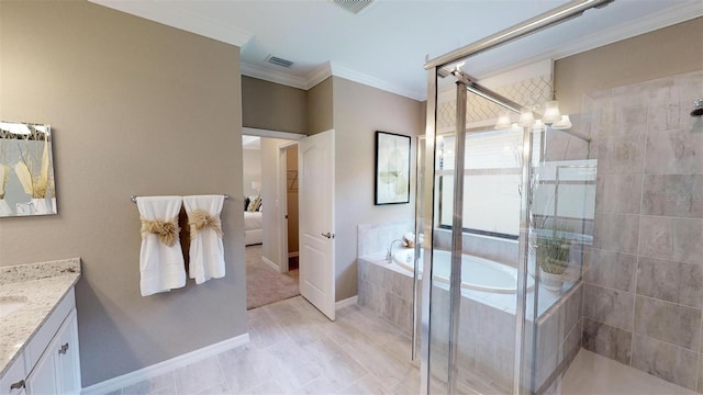 bathroom featuring ornamental molding, vanity, and plus walk in shower