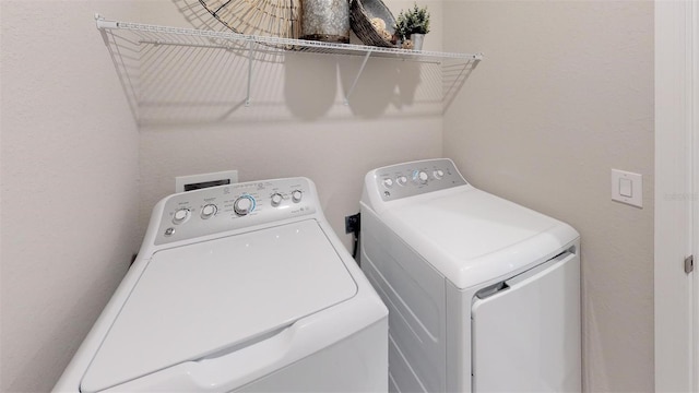 laundry area featuring independent washer and dryer